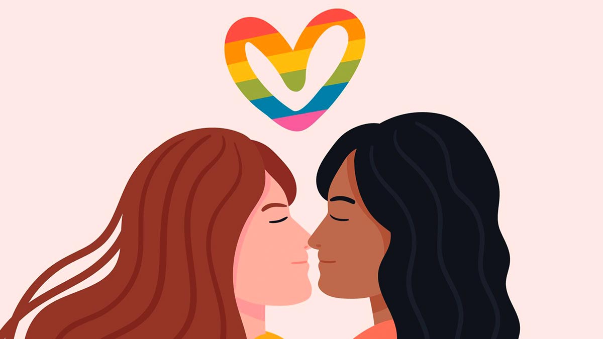 Ilustração de duas mulheres frente a frente com um coração nas cores do arco-íris acima, representando relacionamento lésbico e terapia de casal.
